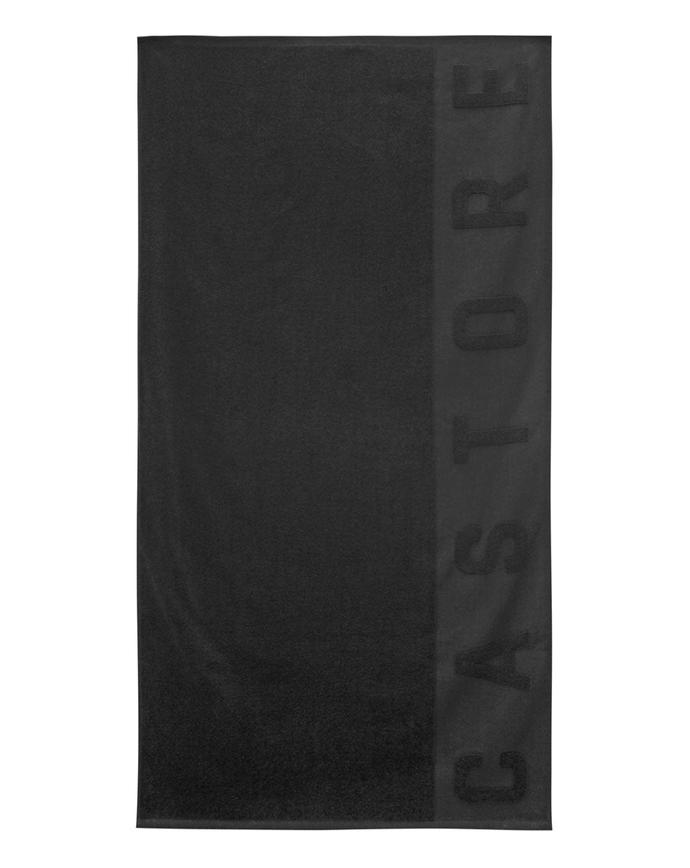 Large black towel with embossed Castore lettering along the right edge.