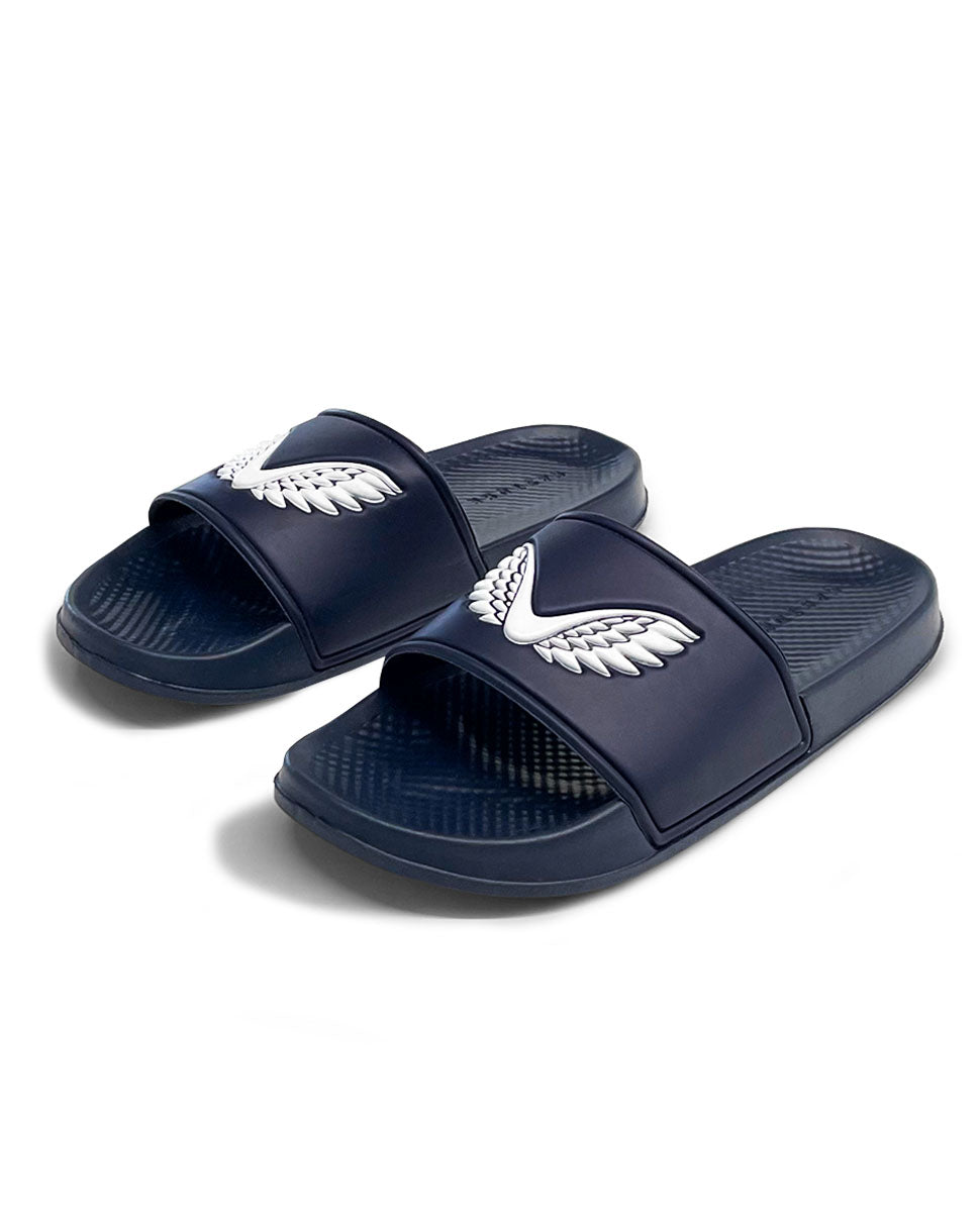 Navy Castore slide sandals with white wing logo and textured footbeds