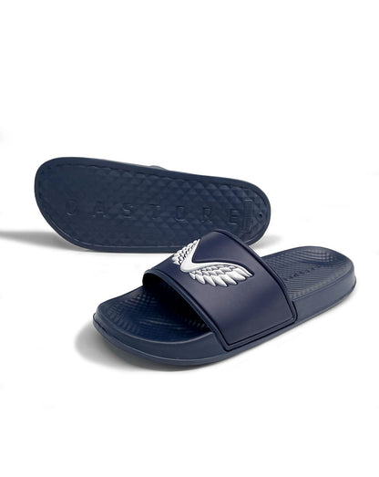 Navy Castore slider with white emblem on strap and branded textured sole.