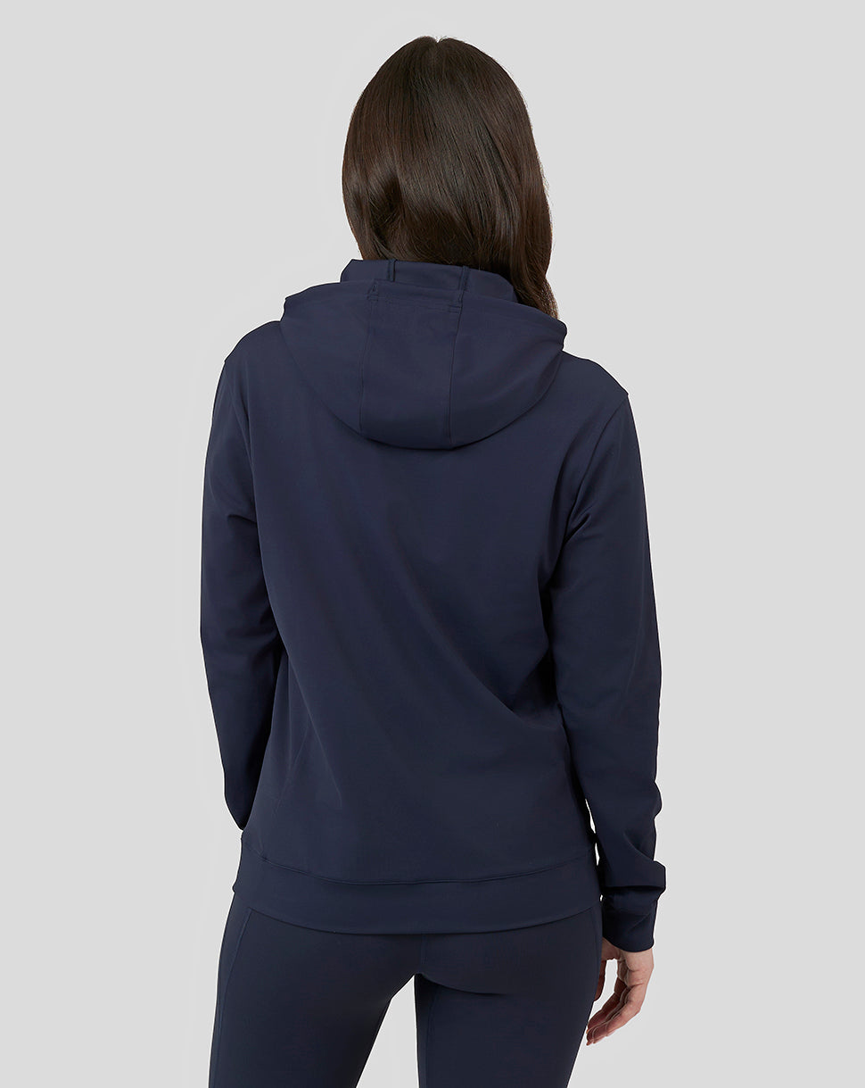 Back view of navy Oracle Red Bull Racing women's overhead hoodie on a model with a relaxed fit and hood.