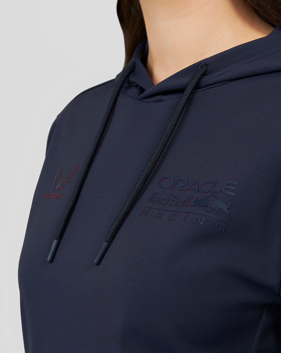 Close-up of the front chest showing embossed Oracle Red Bull Racing branding on the navy hoodie.