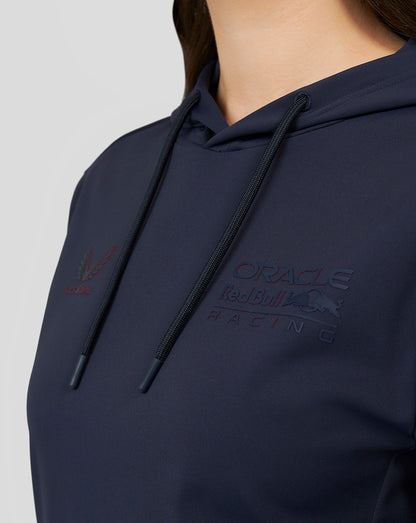 Close-up of the front chest showing embossed Oracle Red Bull Racing branding on the navy hoodie.