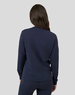Back view of a model wearing a navy Oracle Red Bull Racing Sweat Top from the Night Sky collection