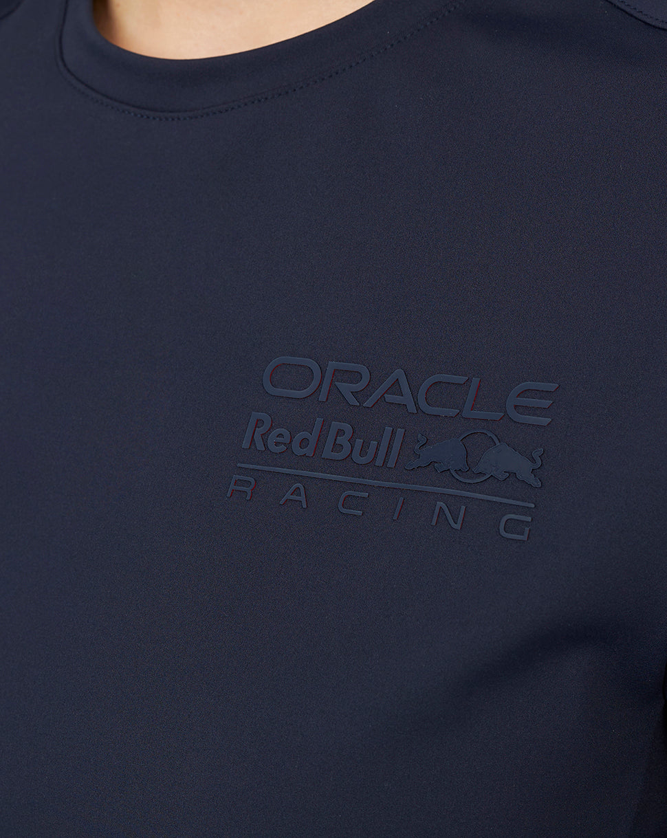 Close up of navy Sweat Top fabric with embossed Oracle Red Bull Racing logo on the chest