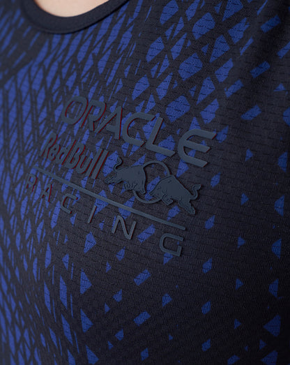 Close-up of front chest showing high-build heat transfer Oracle Red Bull Racing branding on the navy patterned tank top