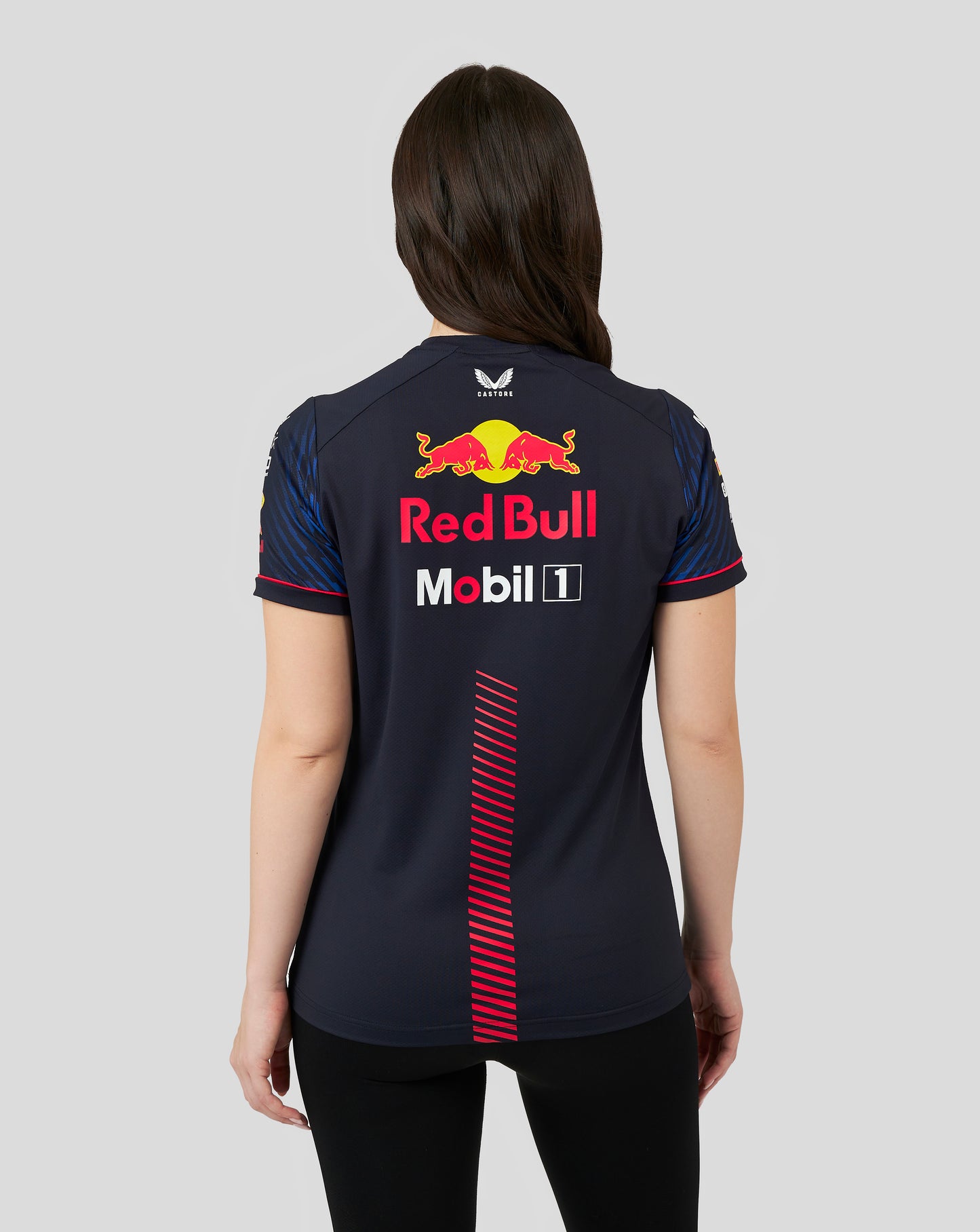 Back view of female model wearing Oracle Red Bull Racing Set Up T Shirt Night Sky with a large Red Bull logo on the back