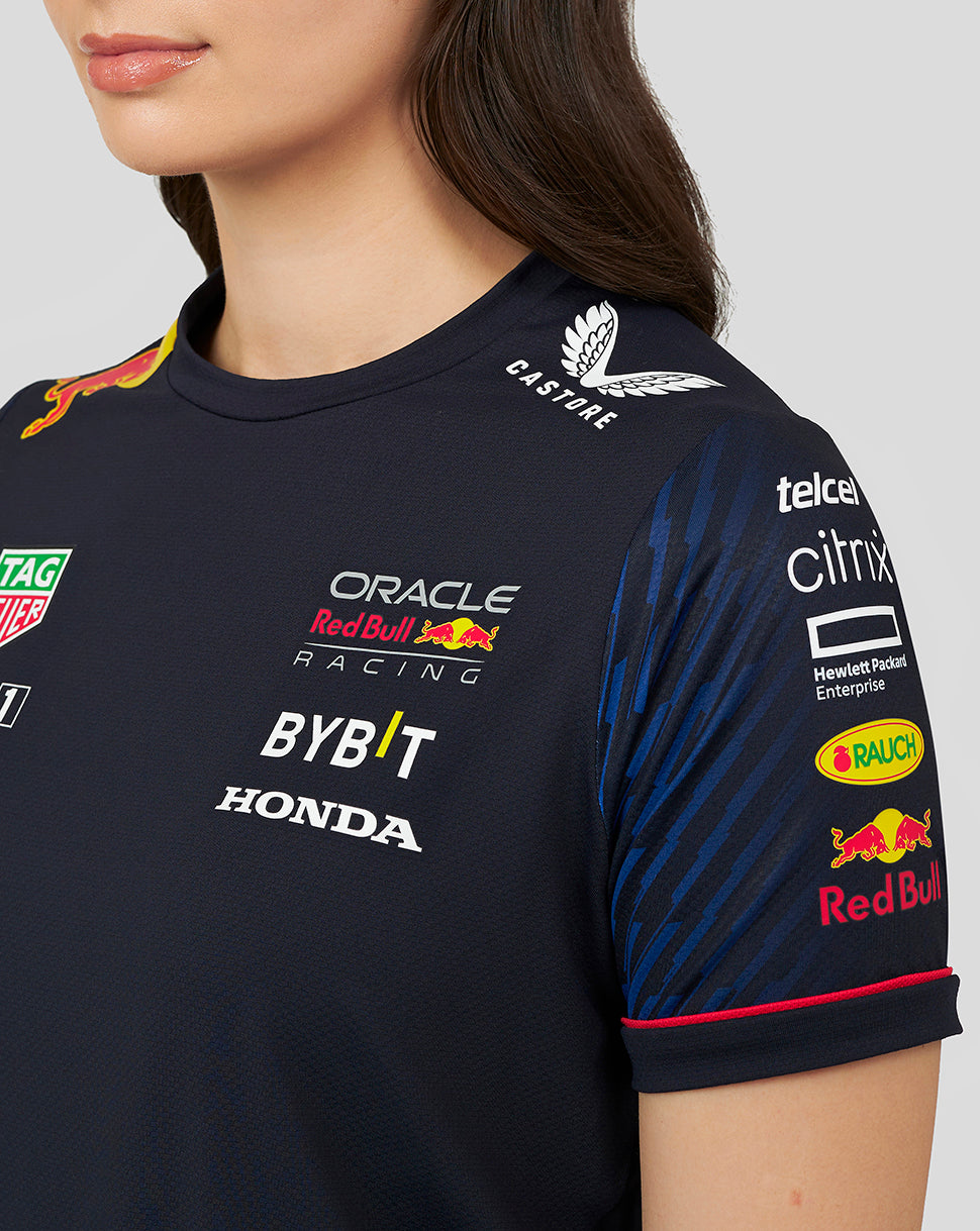 Close up of navy Set Up T Shirt shoulder with sponsor patches and Red Bull branding on the chest area