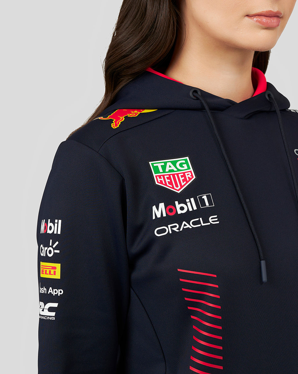 Navy Oracle Red Bull Racing hoodie worn by a model with sponsor logos on the chest and shoulder