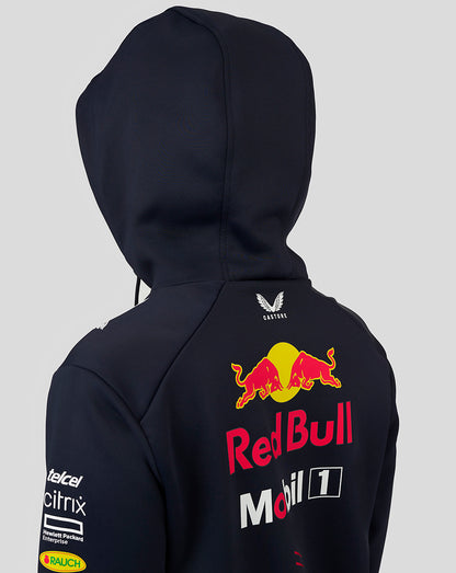 Back view of navy Red Bull Racing hoodie on a model, features a large Red Bull emblem on the back and hood