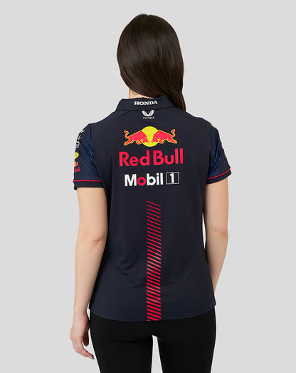 Back view of navy Night Sky Oracle Red Bull Racing polo showing Red Bull and Mobil 1 logos and a red vertical stripe.
