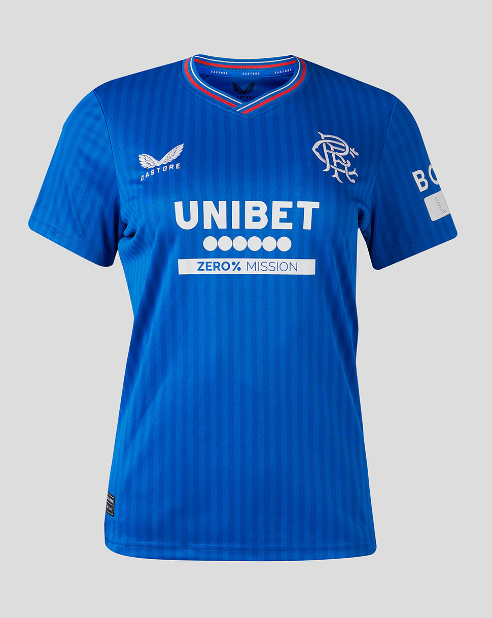 Front view of blue Rangers Women's 23/24 home shirt on model featuring crest and Unibet sponsor.