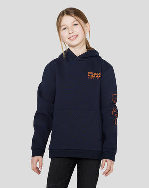 Child wearing a navy Night Sky Junior Oracle Red Bull Racing hoodie with orange chest logo and overhead hood