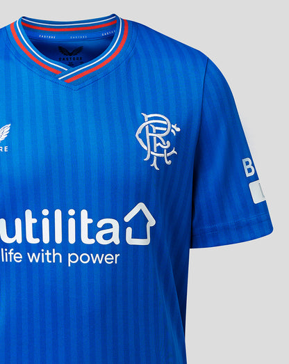 Partial front view focusing on the chest crest striped collar and Utilita sponsor on the Rangers Junior 23/24 Home Shirt