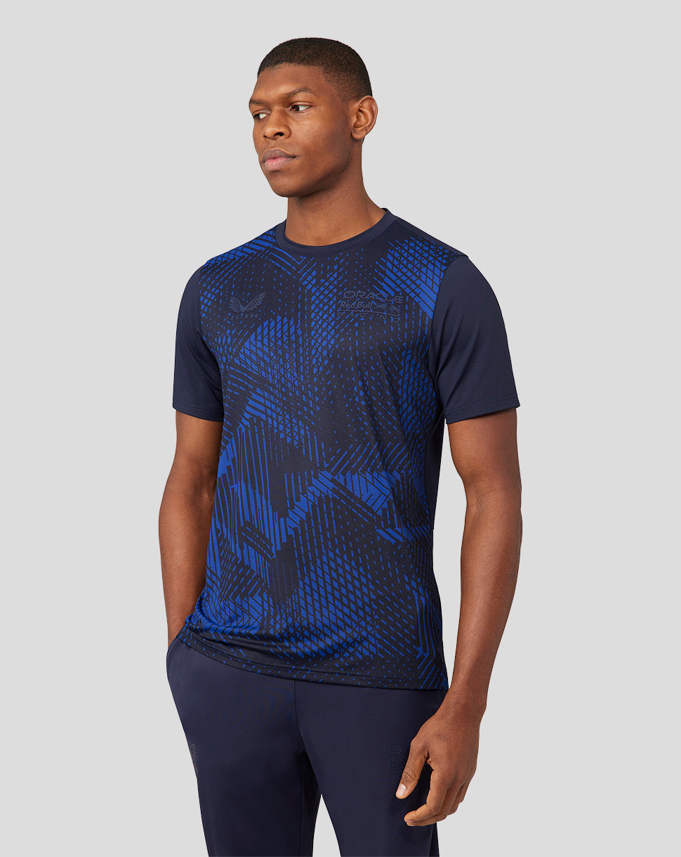 Male model wearing navy Night Sky Oracle Red Bull Racing running T shirt with blue abstract pattern and chest logo