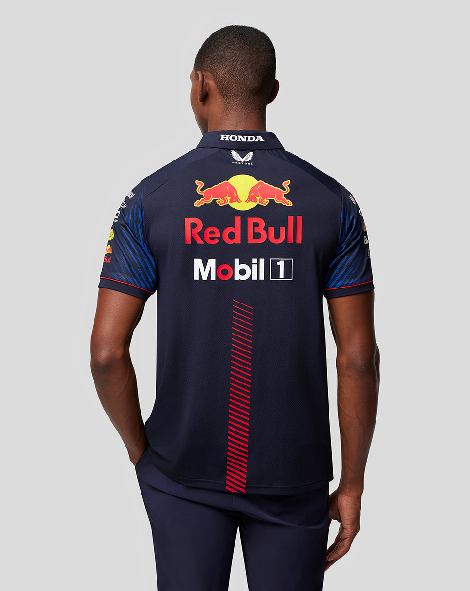 Back view of navy Castore x Oracle Red Bull Racing polo showing the large Red Bull logo and Mobil 1 sponsorship.