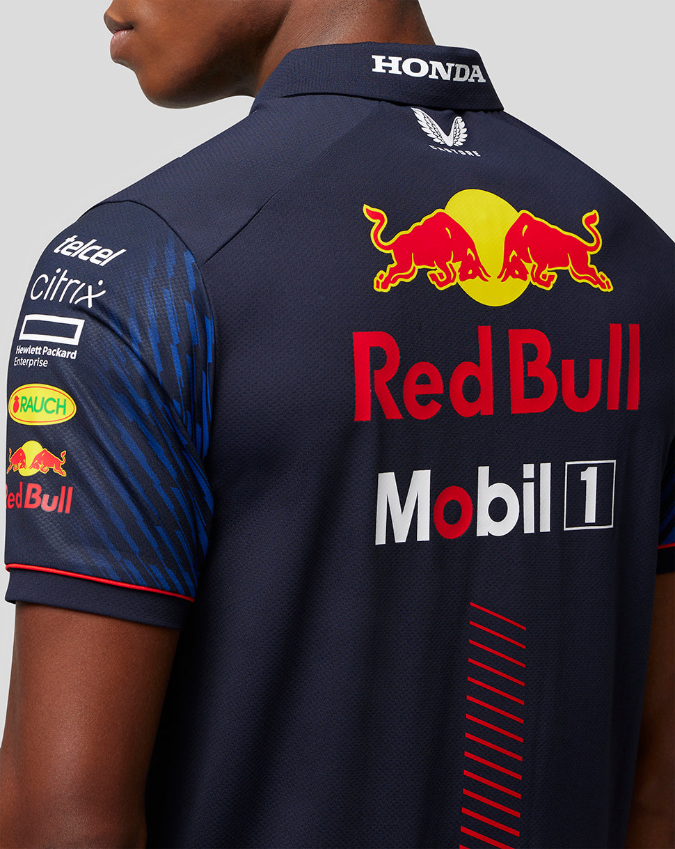 Back view of navy Red Bull polo showing large Red Bull logo on the upper back and Mobil 1 branding.