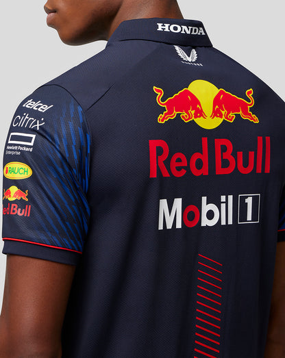 Back view of navy Red Bull polo showing large Red Bull logo on the upper back and Mobil 1 branding.