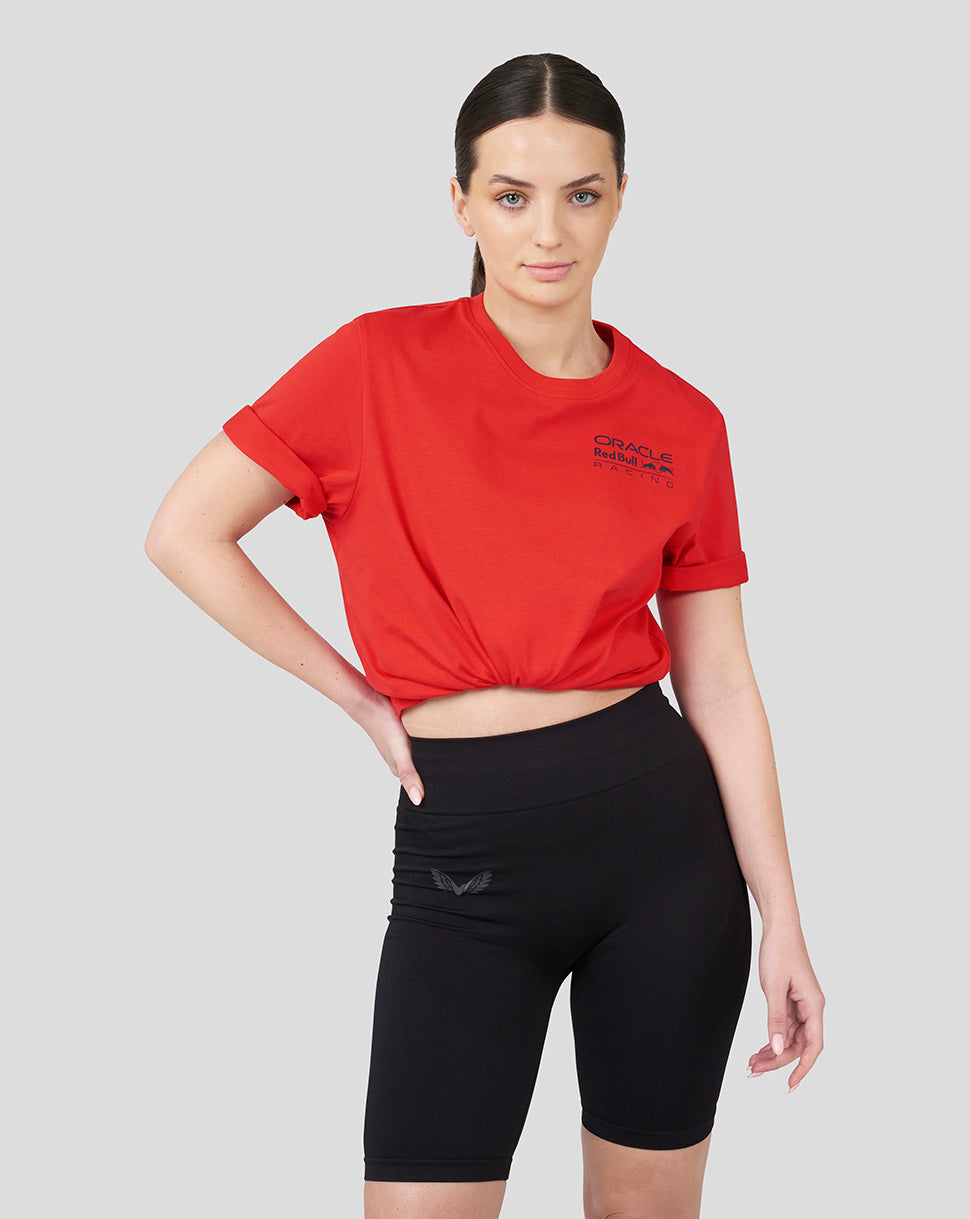 Front view of a red cropped T-shirt tied at the waist with the Oracle Red Bull Racing logo on the chest