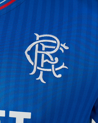 Close-up of blue Rangers home shirt showing embroidered club crest on the chest.