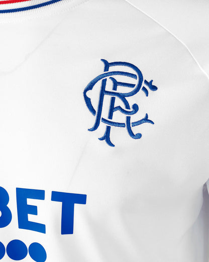Rangers away shirt close up front showing blue club crest on left chest and UNIBET sponsor across the white fabric