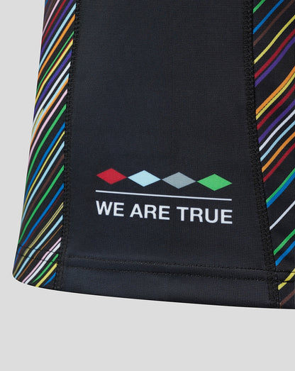 Lower front of Pride shirt featuring We Are True slogan and multicolor diamonds on dark fabric