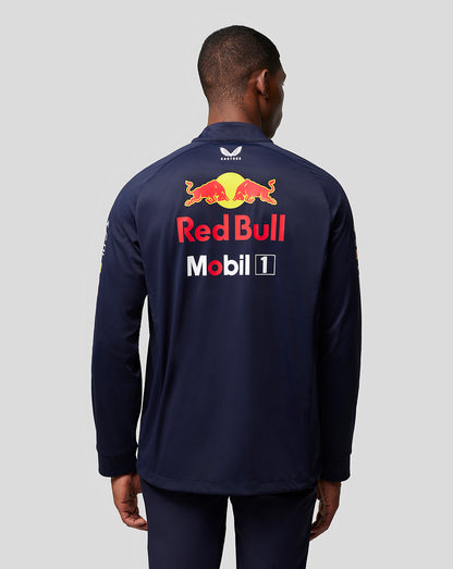 Back view of a navy Oracle Red Bull Racing soft shell jacket with a large Red Bull logo and sponsor patches