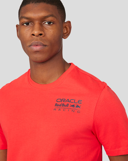 Close up of a male model wearing a flame scarlet Oracle Red Bull Racing Core T shirt with a chest logo