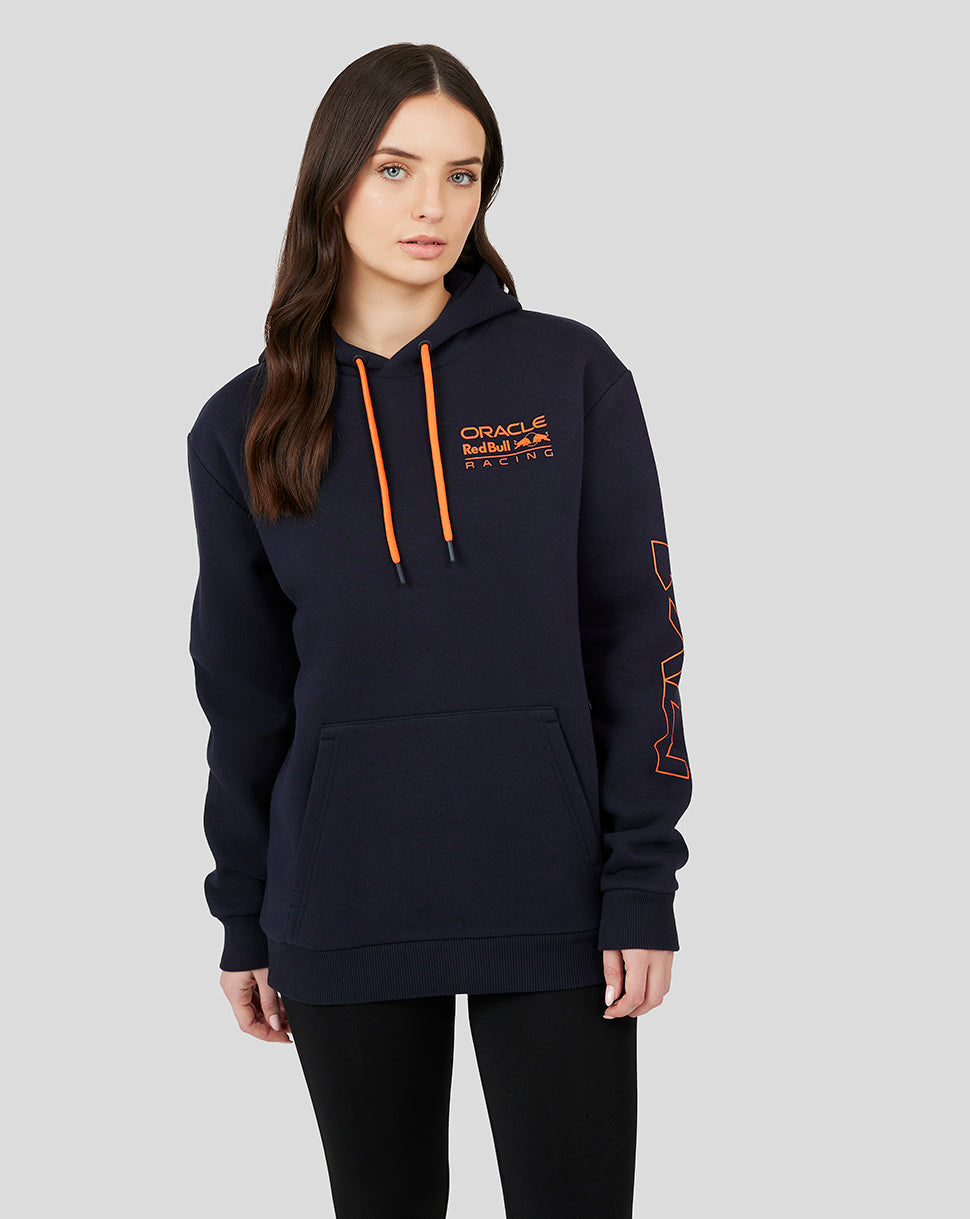 Female model wearing navy Night Sky Oracle Red Bull Racing hoodie with orange drawstrings and logos on chest sleeve and back