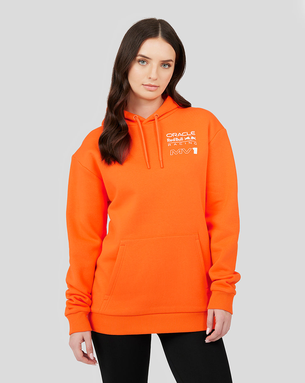 Woman wearing an exotic orange Oracle Red Bull Racing hoodie with chest logo visible