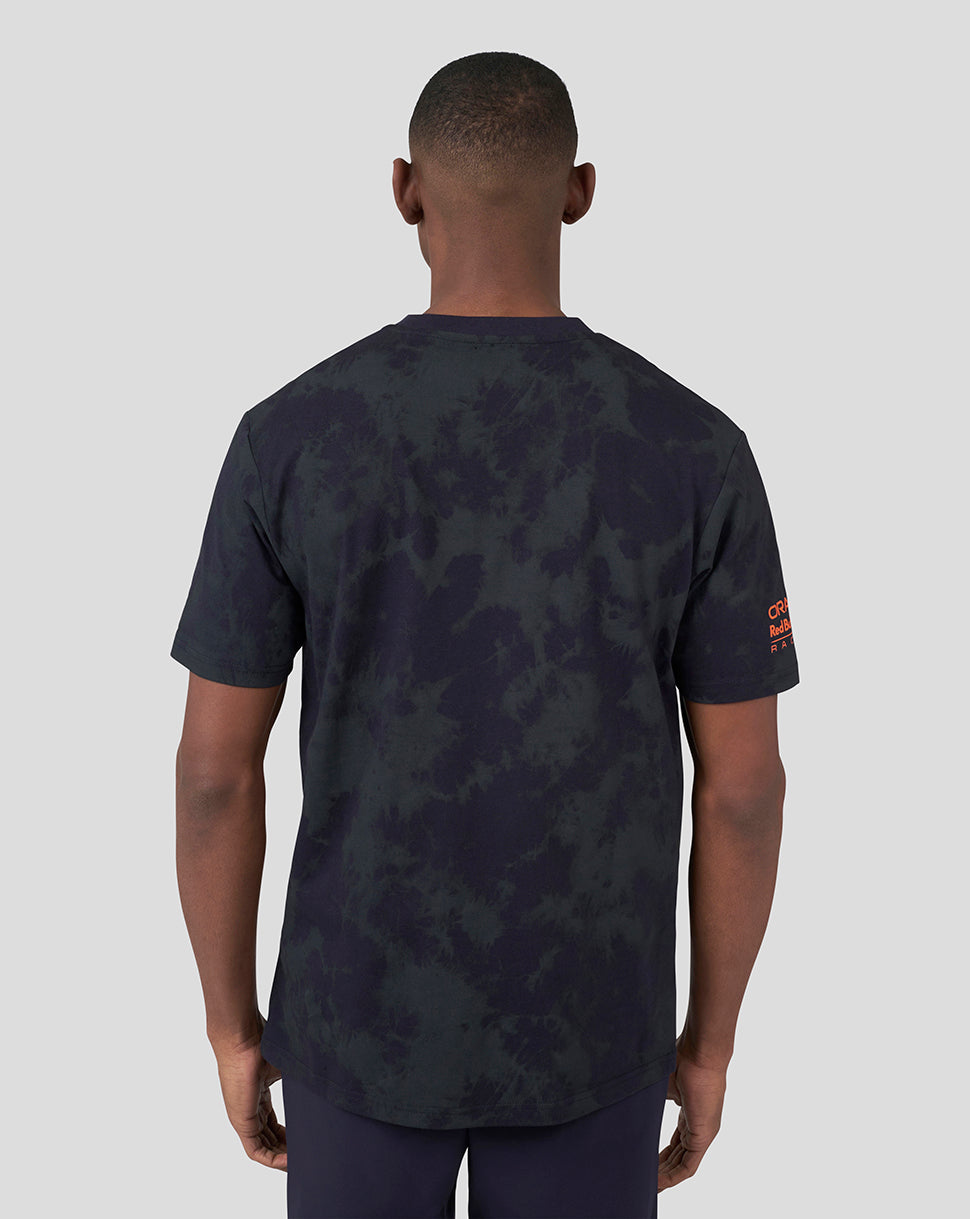 Back view of a dark tie-dye oversized Oracle Red Bull Racing T-shirt with orange logo on the sleeve