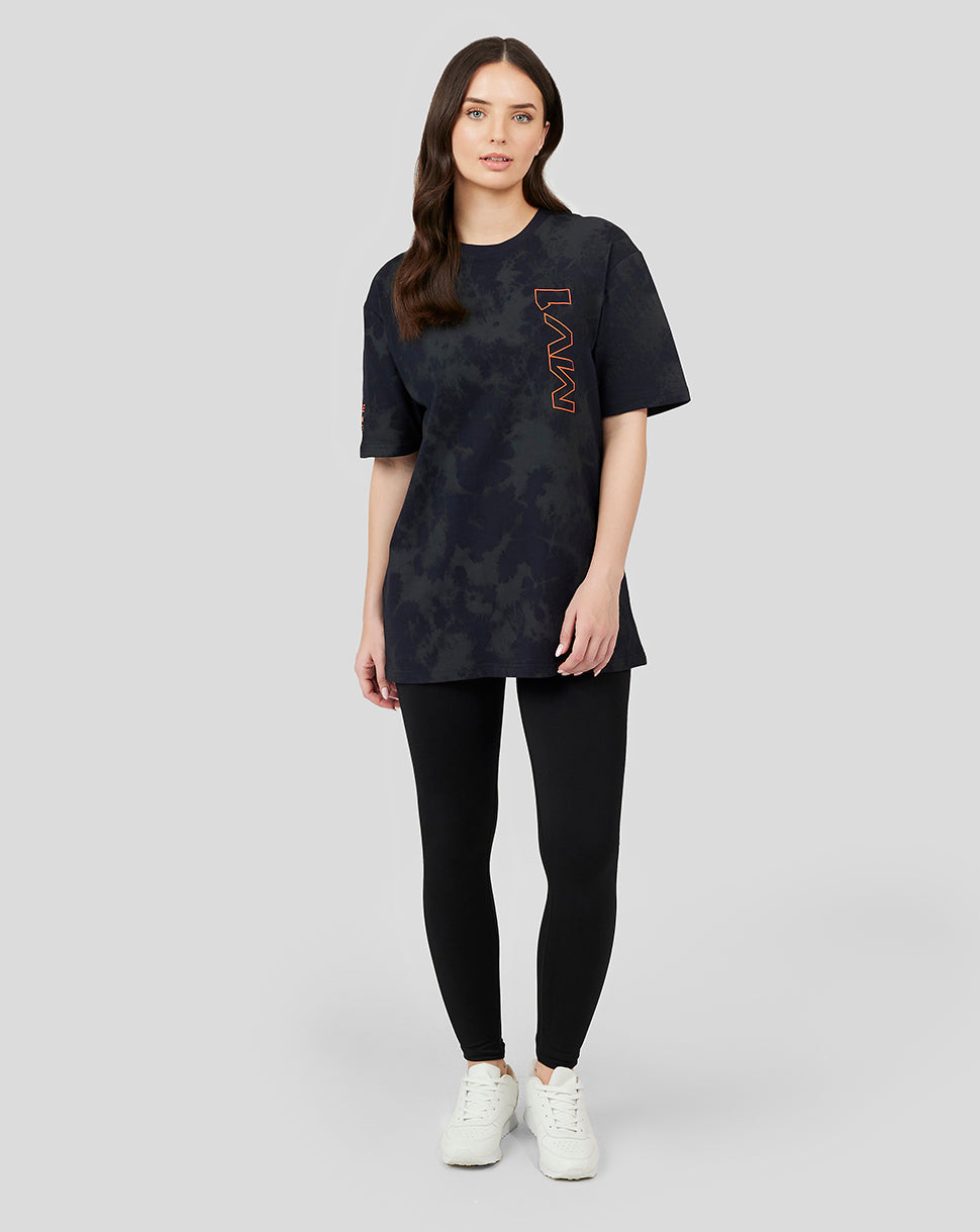 Female model wearing a dark tie-dye Oracle Red Bull Racing Max Verstappen oversized unisex T-shirt with an orange vertical MAX logo
