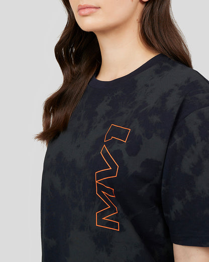 Close up of dark tie-dye Max Verstappen T-shirt with orange outlined VERSTAPPEN on the chest