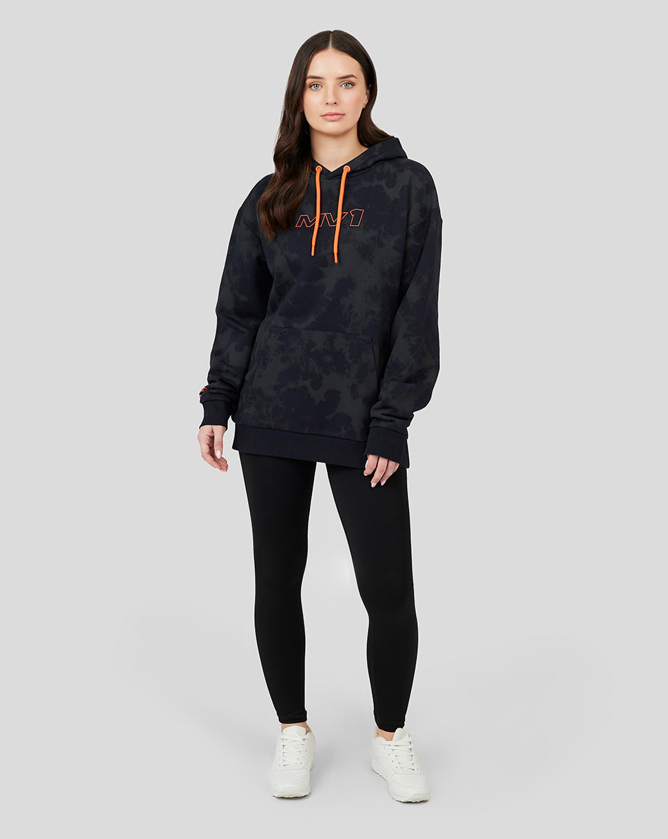 Model wearing an oversized black camouflage Oracle Red Bull Racing Unisex Driver Max Verstappen Hoodie with orange drawstrings