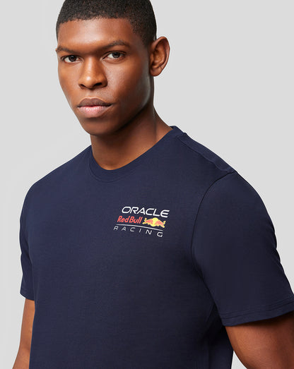 Model front three quarter view in navy Oracle Red Bull Racing T shirt with small left chest logo.