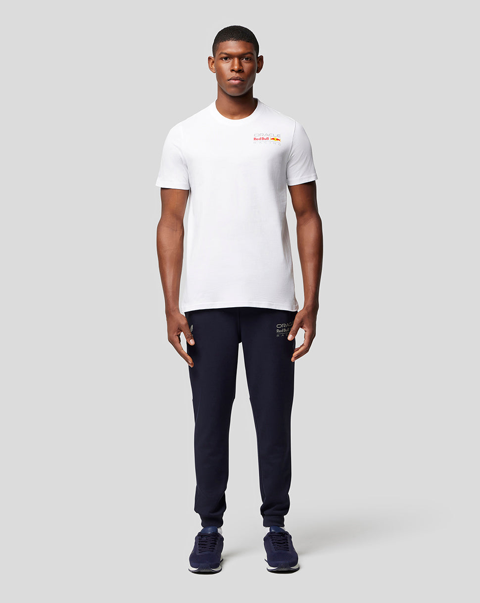Male model wearing white Oracle Red Bull Racing Core T Shirt with full colour left chest logo.
