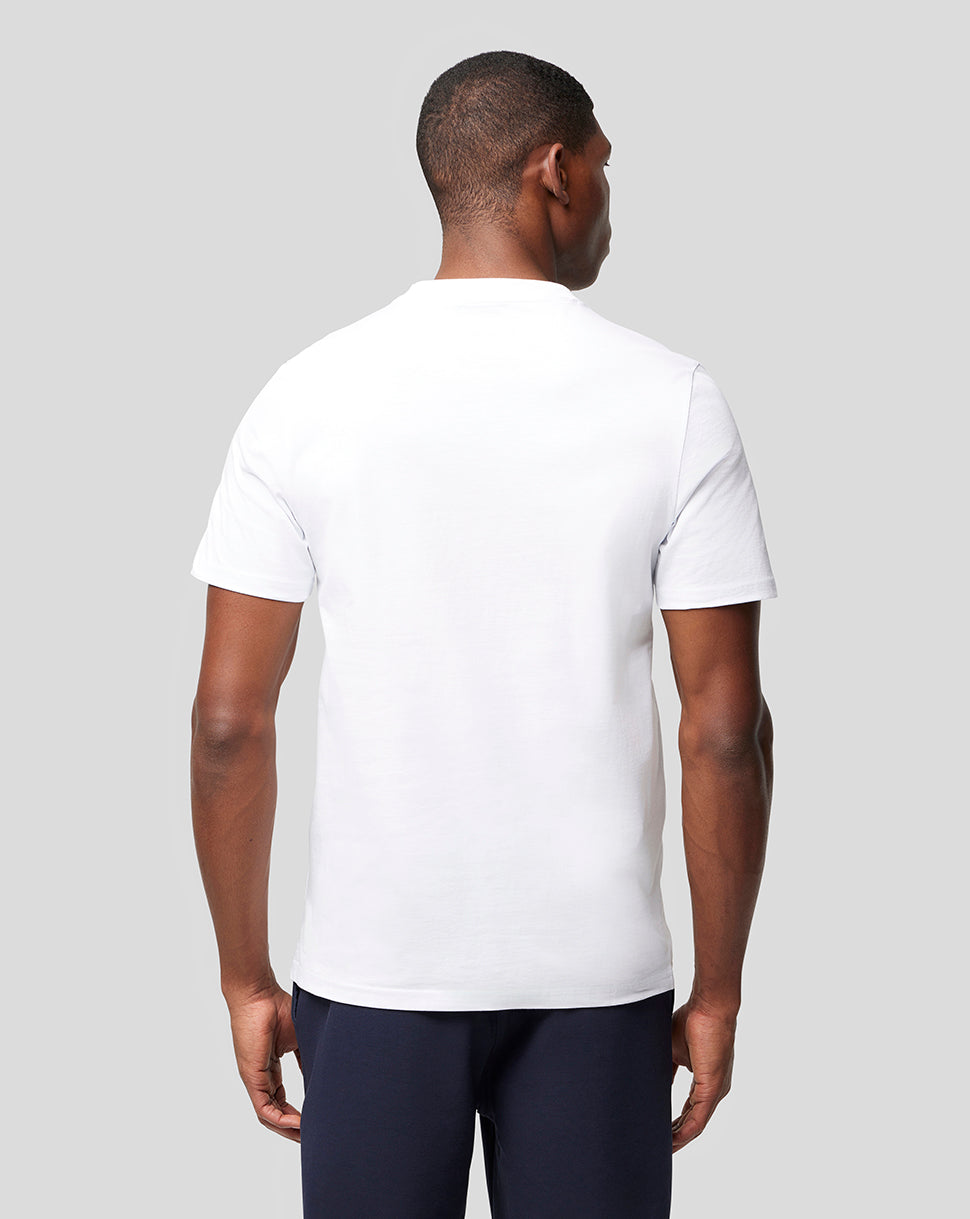 Back view of a man wearing a plain white Oracle Red Bull Racing T shirt