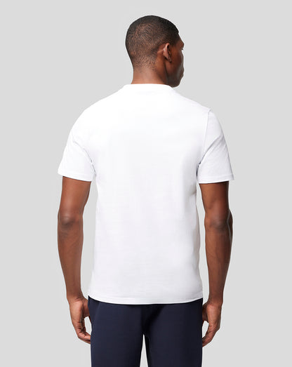 Back view of a man wearing a plain white Oracle Red Bull Racing T shirt