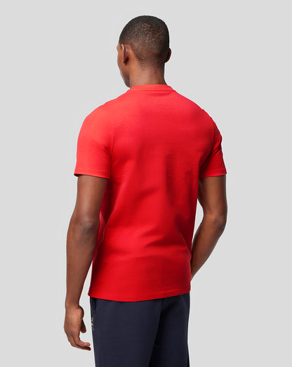 Back view of a man wearing a flame scarlet Oracle Red Bull Racing T shirt