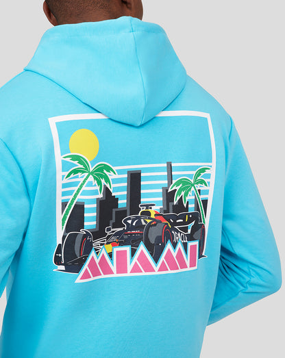Back view of a man wearing River Blue hoodie with a large Miami graphic on the back.