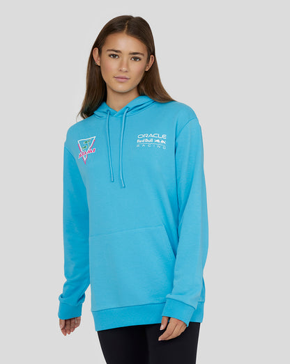 Female model wearing light blue Oracle Red Bull Racing Miami hoodie with front logo