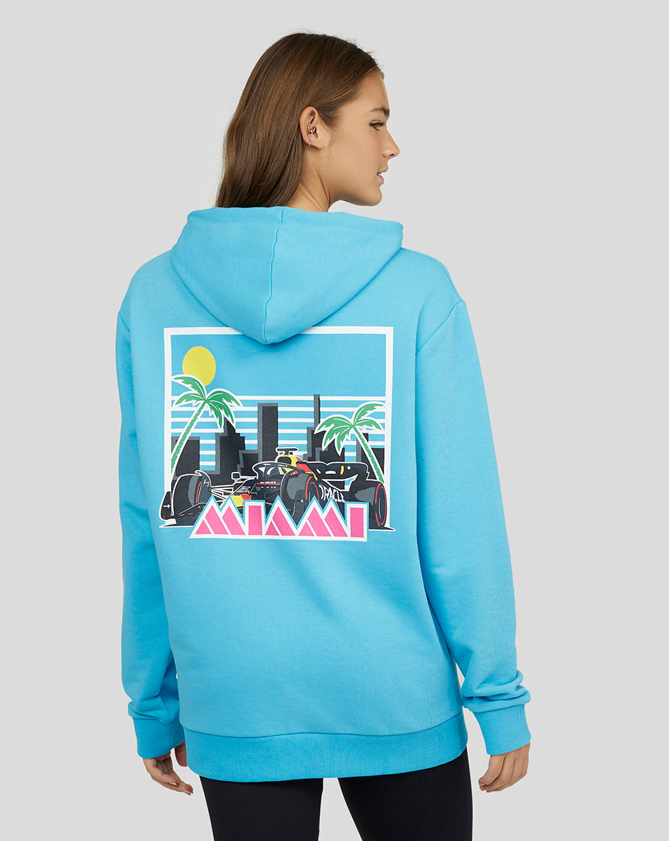 Back view of River Blue hoodie with a bold Miami graphic on the back featuring palm trees and skyline.